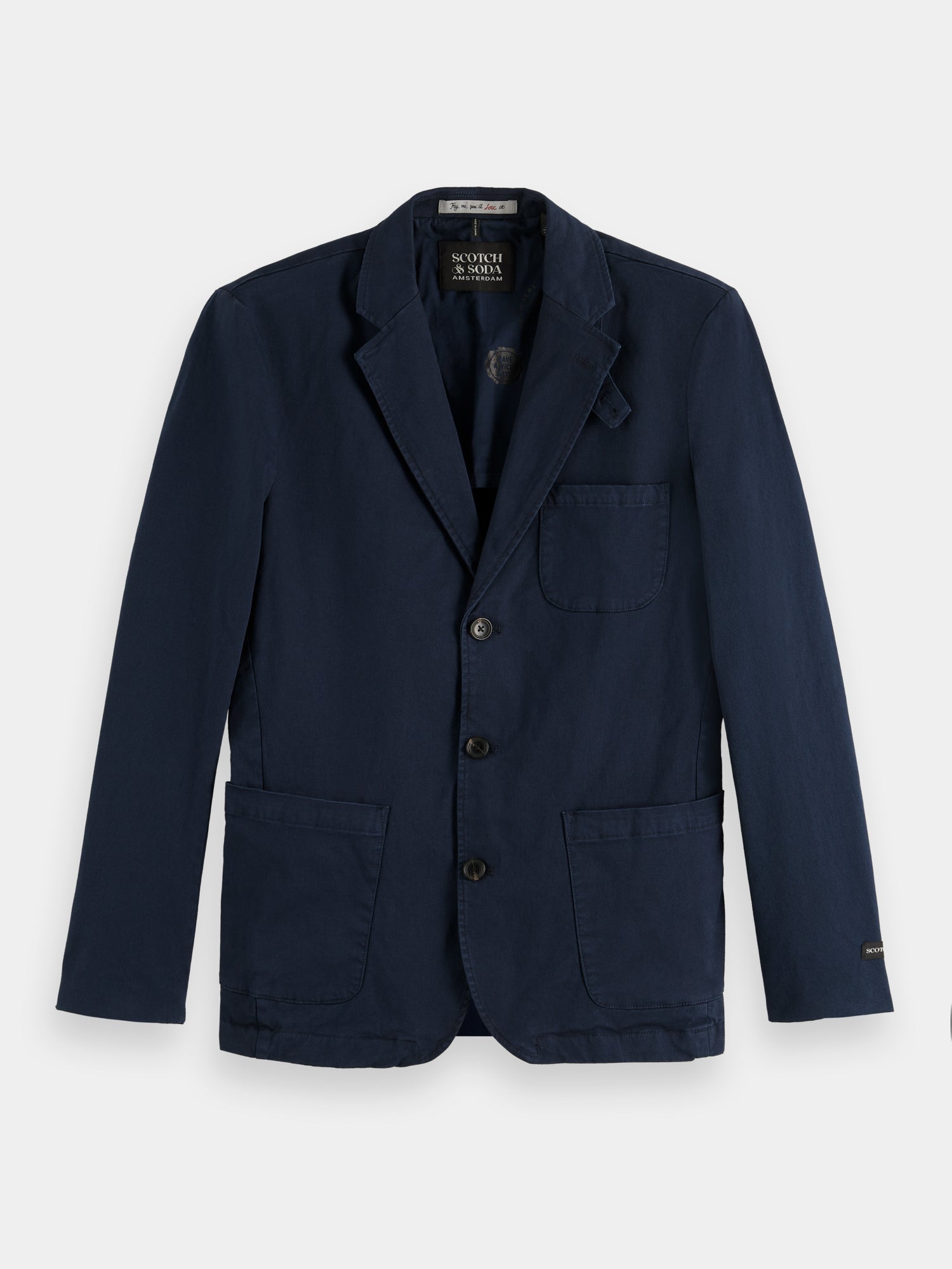 Structured garment-dyed cotton-blend blazer from Scotch & Soda, featuring a tailored fit and classic design.