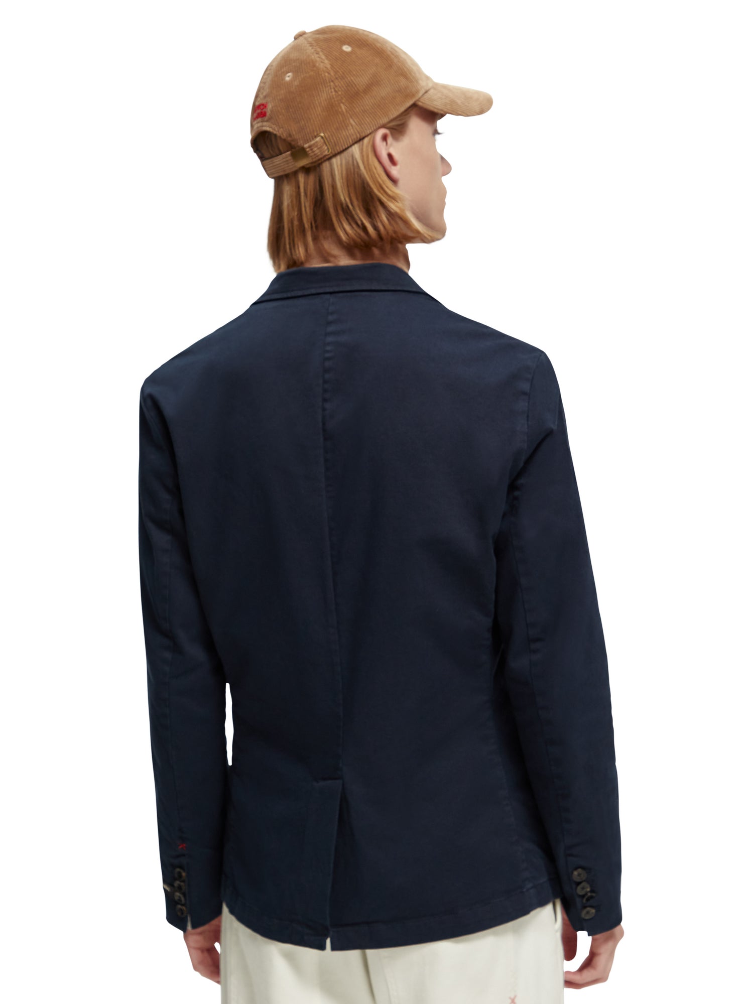 Structured garment-dyed cotton-blend blazer from Scotch & Soda, shown in a close-up view highlighting the fabric and tailored design.