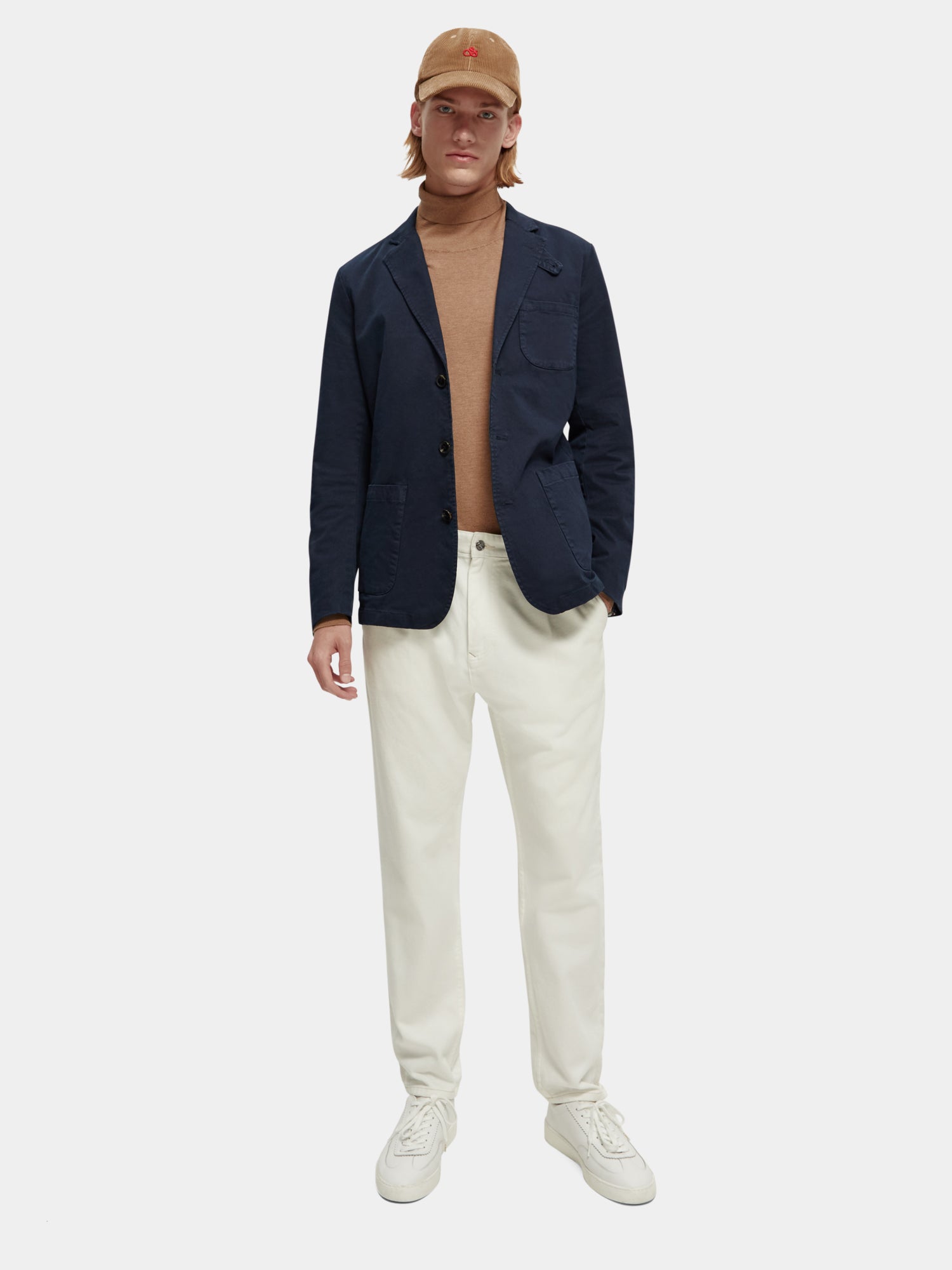 Structured cotton-blend blazer by Scotch & Soda featuring garment-dyed fabric, tailored fit, and classic lapel design.