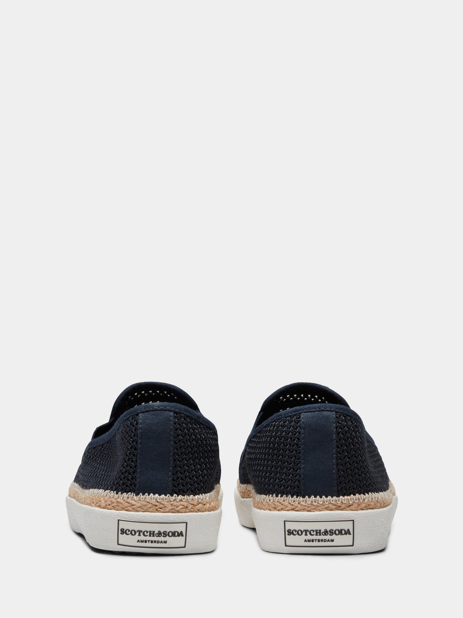 Black Izomi slip-on shoe by Scotch & Soda featuring a sleek design and comfortable footwear style.