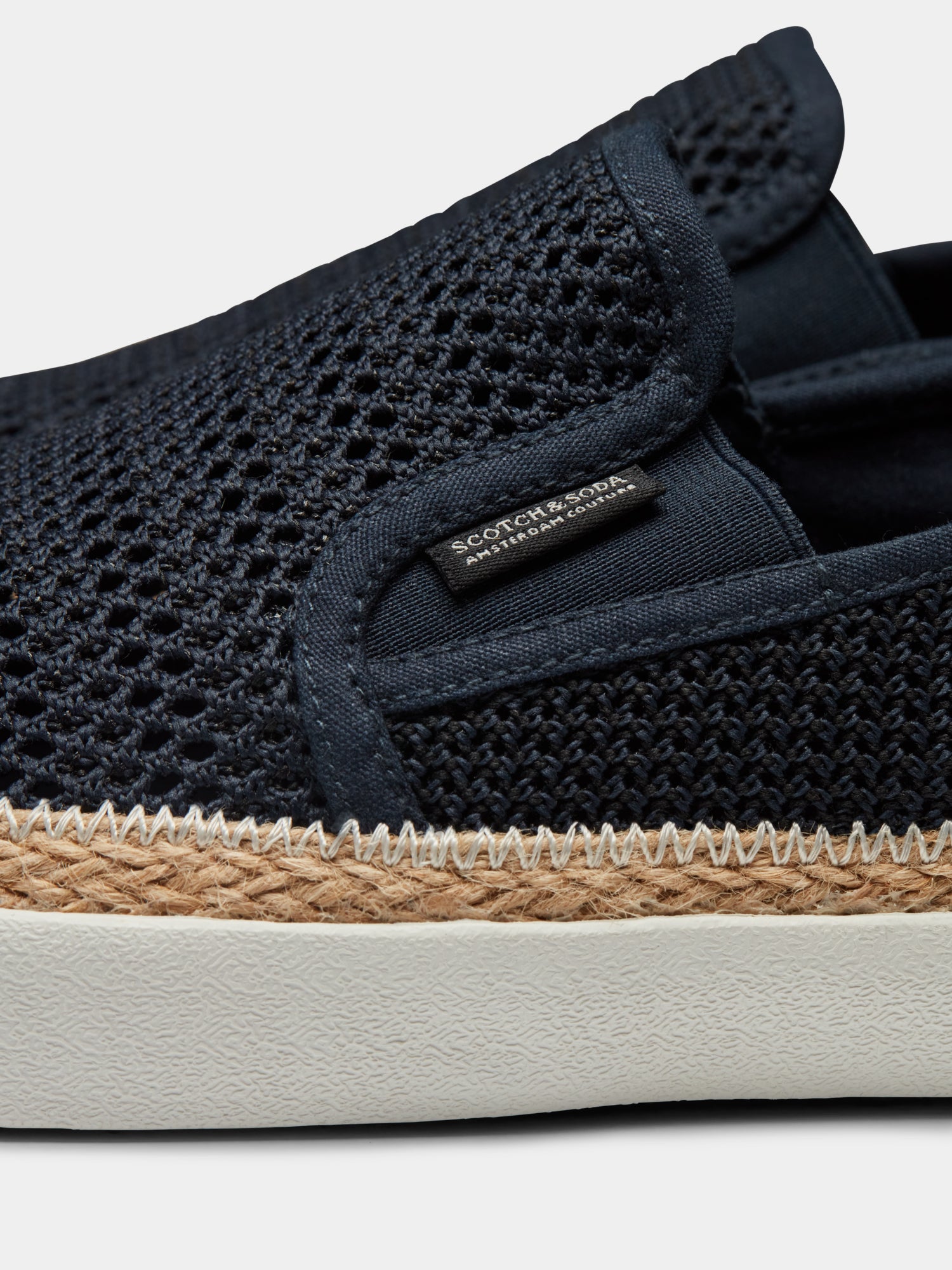 SCOTCH & SODA Izomi slip-on shoe, stylish footwear with a sleek design, featuring a comfortable slip-on style and modern details.